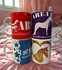 coffee mugs with Area VII logo
